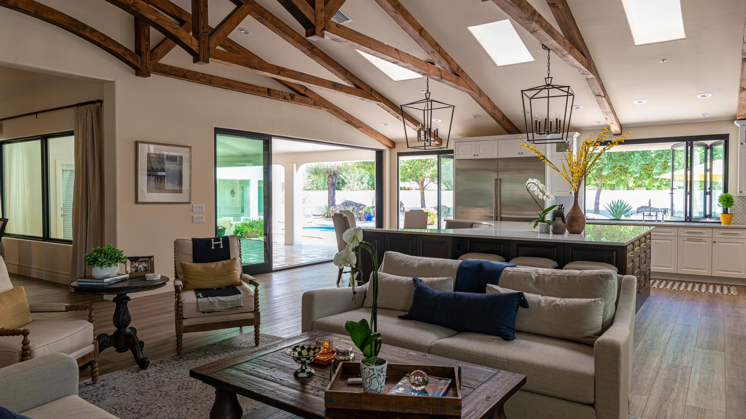 Bright, spotless open-plan living room and kitchen